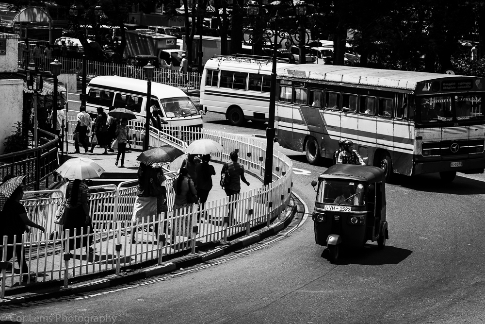 Rickshaw and Bus on Dalada Vidiya street, Kandy, Sri Lanka (Janu